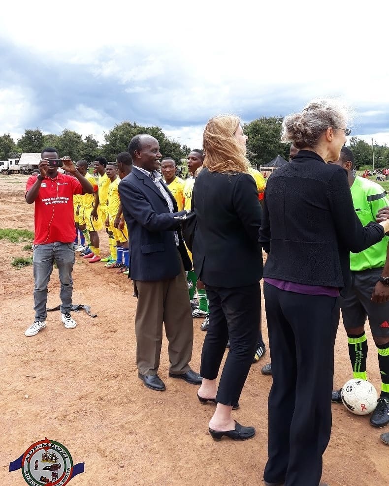 You are currently viewing HJFMRI visitors and ADP Mbozi Executive Director greeting footballers before the kickoff.